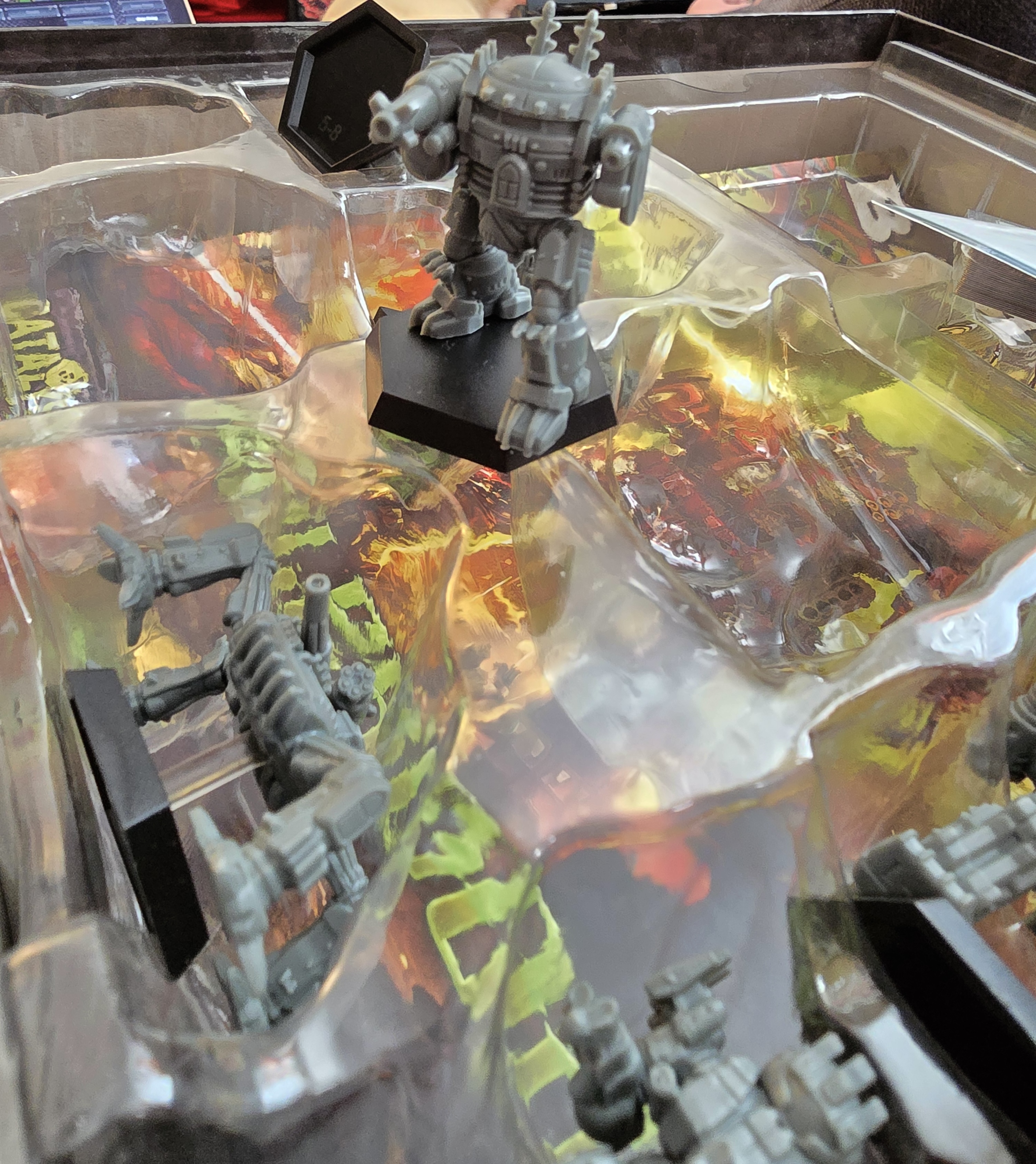 A view of the opened BattleTech Gothic box, with the UrbanMech mini proudly centered.